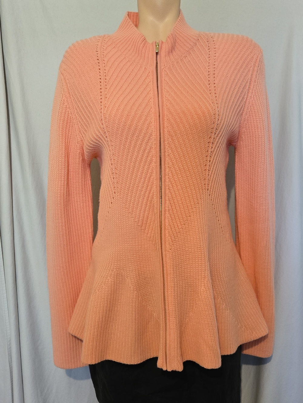 This St. John peach zip-front cardigan unique peplum swing hem .